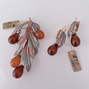Amber colored dangle brooch with matching clip on earrings